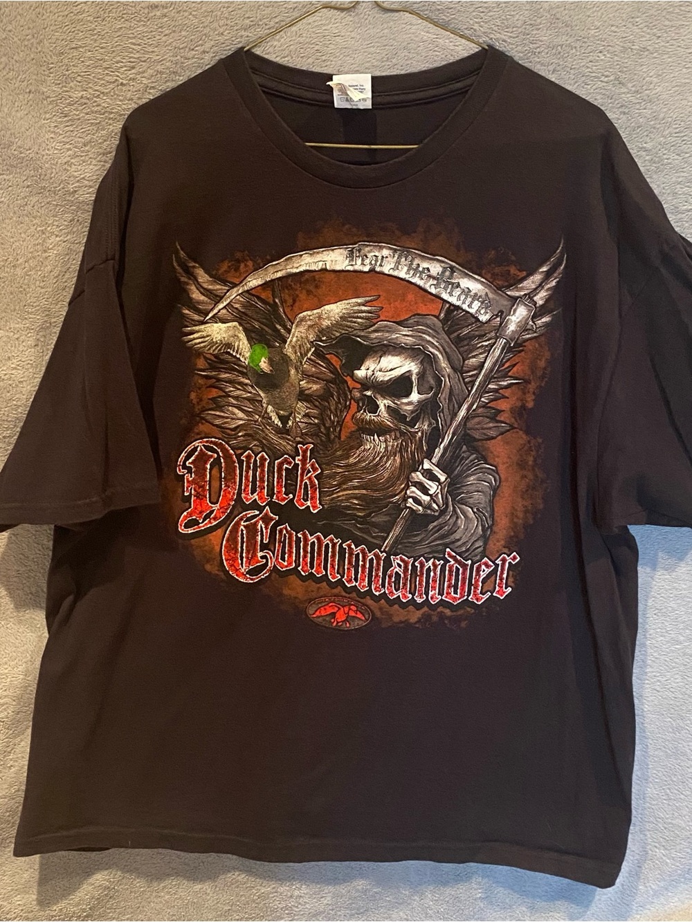 Duck Commander Graphic Short Sleeve Tee in Black with Orange and Green Accents